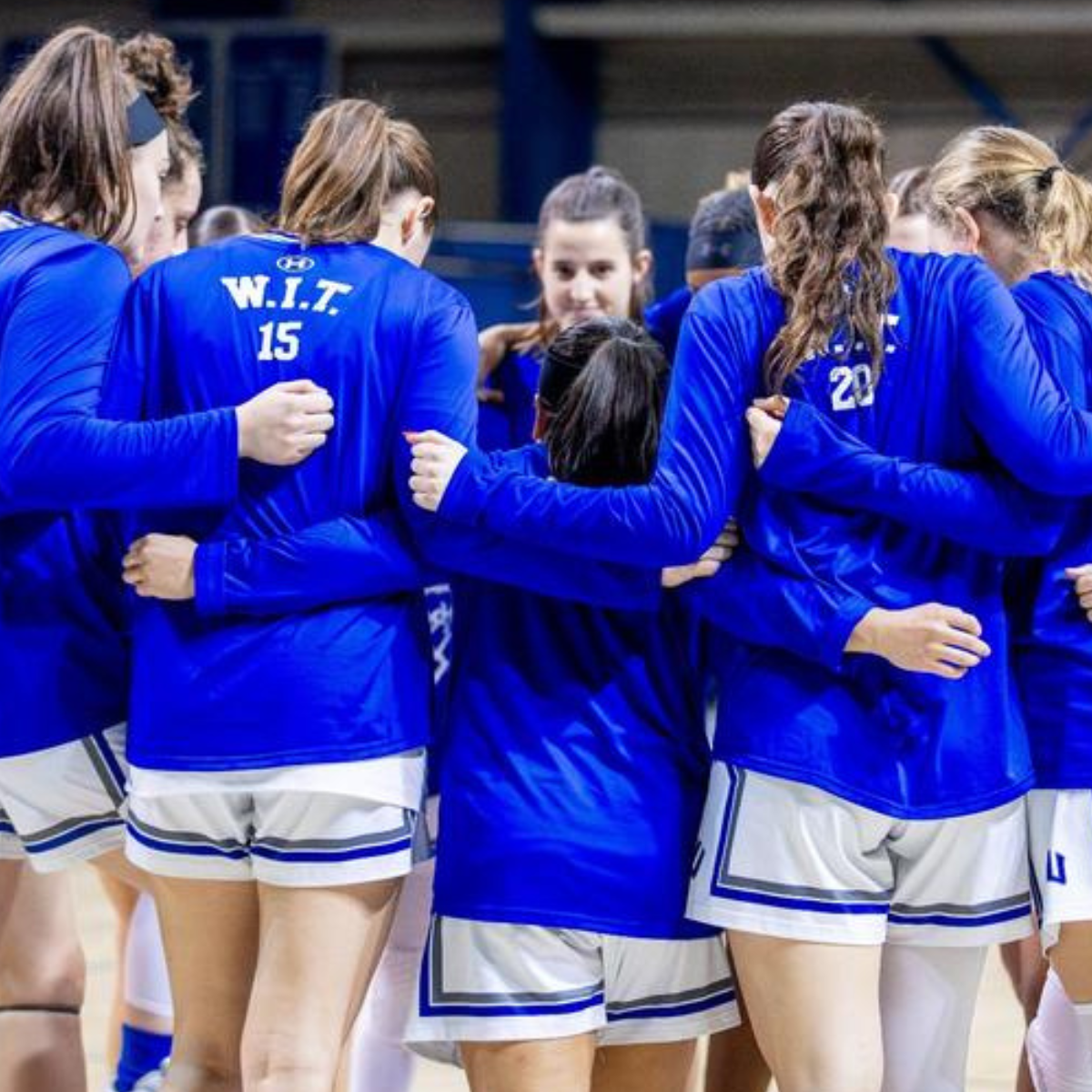 CNU Women's Basketball players huddled on the court